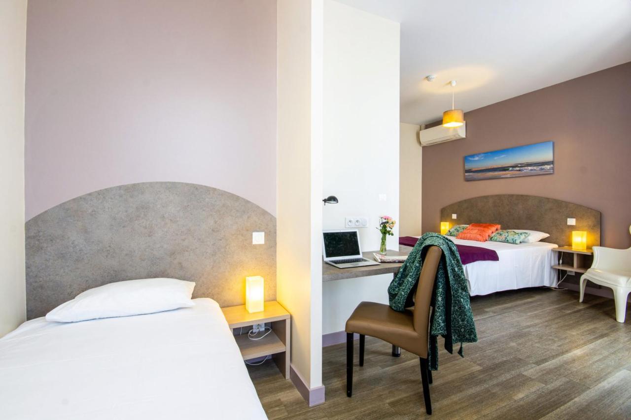 Cit'Hotel Le Commerce Saujon Esterno foto